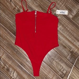 Frankie’s red one piece swimsuit